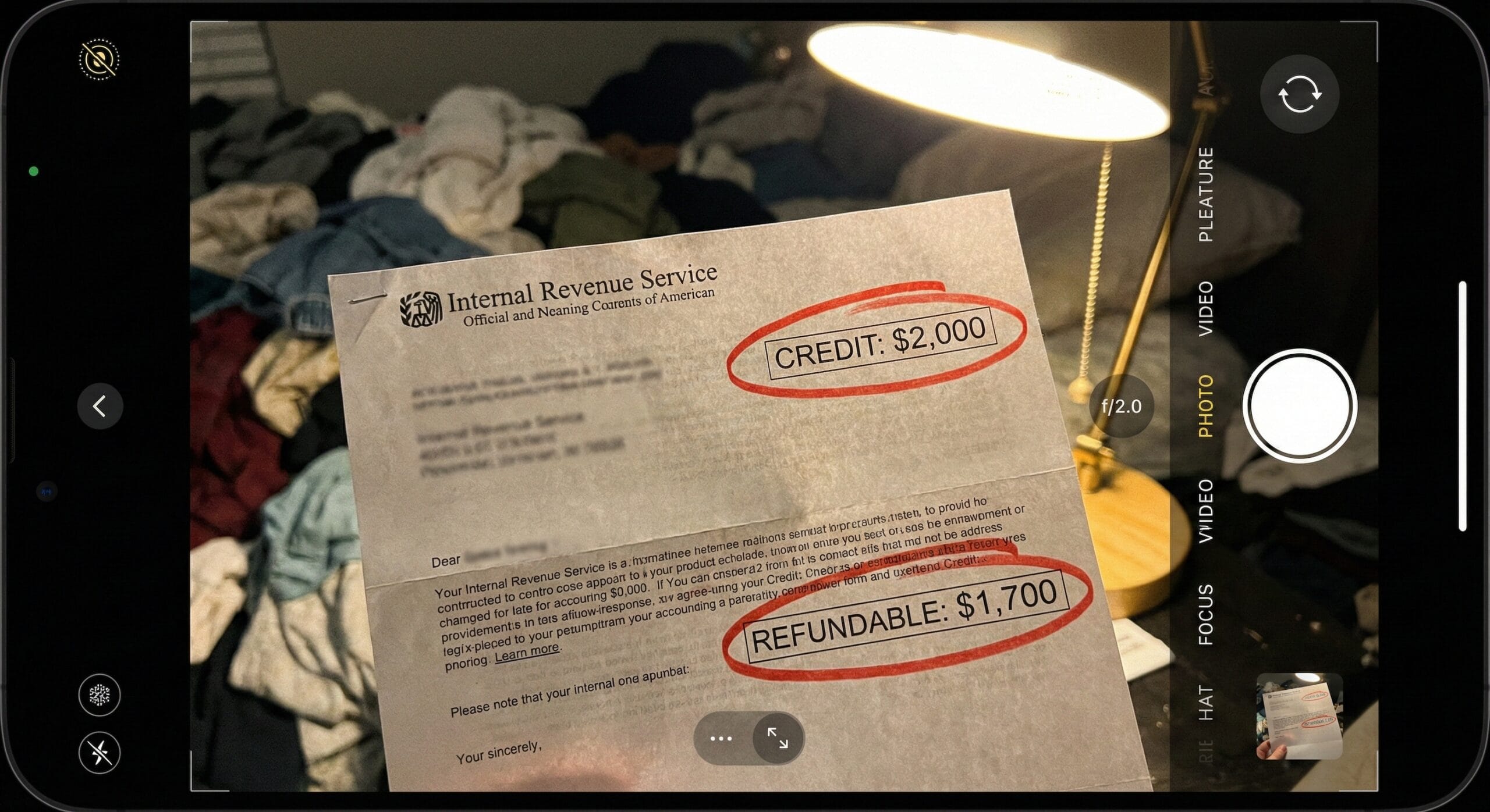 Crumpled IRS tax notice on a messy desk showing Child Tax Credit calculations